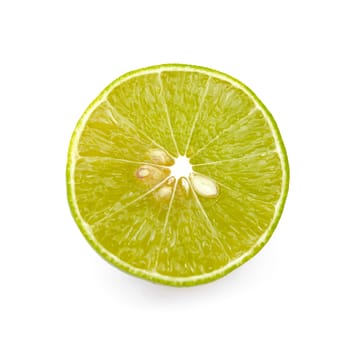 Juicy slices of lime cut in half isolated on white background.