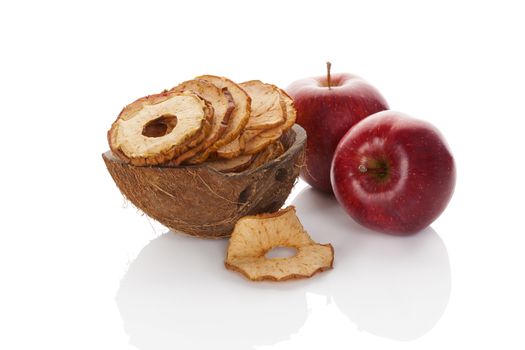 Dry and fresh apples isolated on white background. Healthy snack eating.