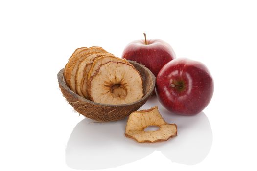 Dry and fresh apples isolated on white background. Healthy snack eating.