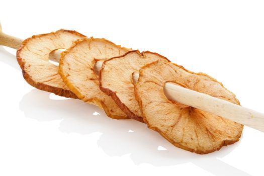 Dry apples isolated on white background. Healthy snack eating.