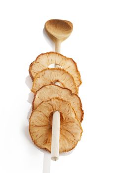 Dry apples isolated on white background. Healthy snack eating.