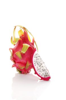 Delicious ripe dragon fruit isolated on white background. Tropical fruit, pitaya concept. Healthy eating. 