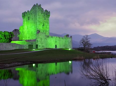 Ross Castle in Killarney National Park, Ireland. Evening view during Patrick day.