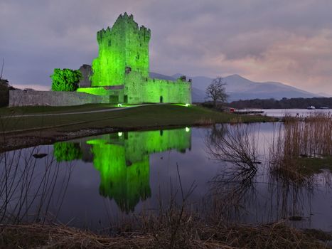 Ross Castle in Killarney National Park, Ireland. Evening view during Patrick day.