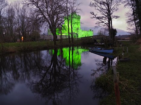 Ross Castle in Killarney National Park, Ireland. Evening view during Patrick day.
