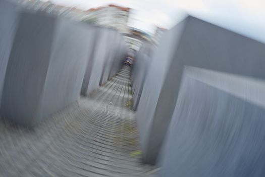 BERLIN, GERMANY - JULY 08: Memorial to the Murdered Jews of Europe photographed using a spin technique. July 08, 2015 in Berlin.