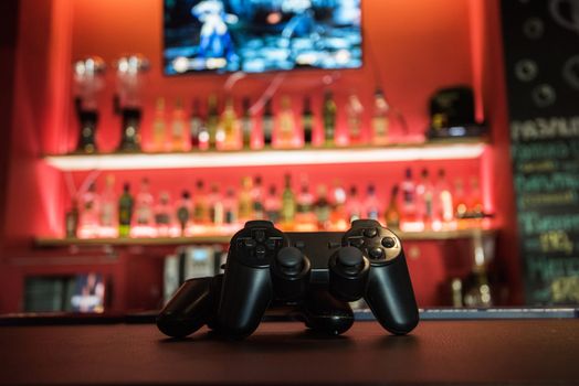 Video games at bar counter