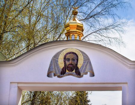 White Jesus Mosaic Gate Mikhaylovsky Church Vydubytsky Monastery Kiev Ukraine.  Vydubytsky Monastery is the oldest functioning Orthordox Monasatery in Kiev.  The original monastery was created in the 1000s, 10th Century.