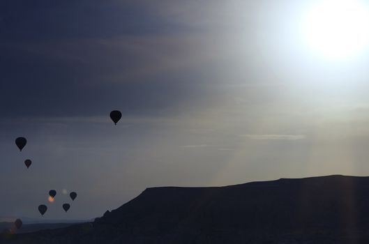 Silhouette of air balloons in the sky