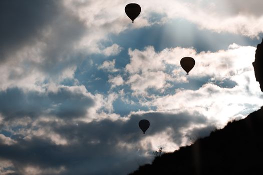 Silhouette of air balloons in the sky