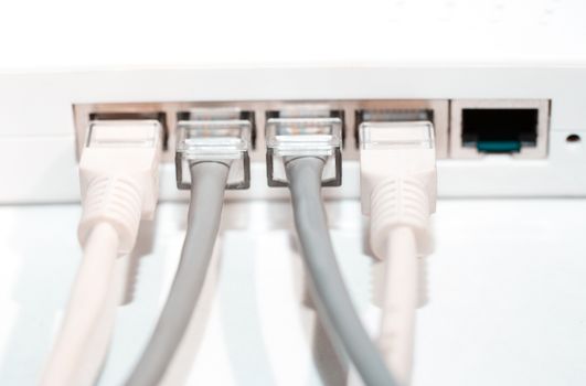 Network modem with cables. Close-up horizontal photo