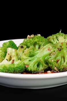 Broccoli florets for hot sauce, garlic and spices