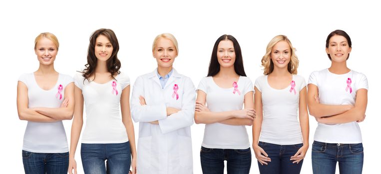 healthcare and medicine concept - group of smiling women and doctor in blank t-shirts with pink breast cancer awareness ribbons
