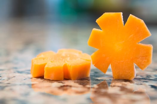 Carrot slices isolated on a granite