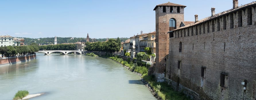 VERONA, ITALY - JULY 13: Stitched panorama of Castelvecchio and Adige river, with other areas of Verona in the background. July 13, 2015 in Verona.