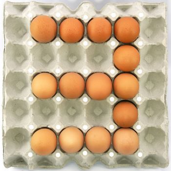 Number three of eggs in the paper package tray