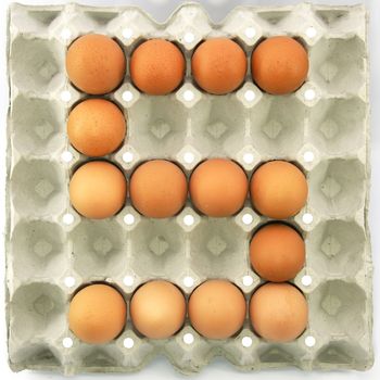 Number five of eggs in the paper package tray