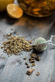 tea composition with cinnamon sticks, lemons