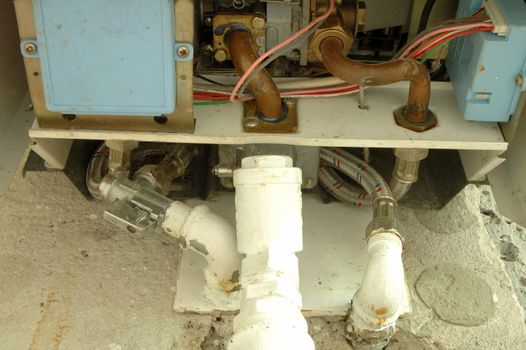Gas and water pipes connected to heating device