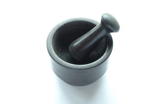 Mortar and pestle on white background