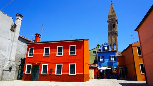 Burano colorful building architecture with church background, Venice, Italy