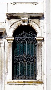 wrought iron ancient window detail in Murano, Venice, Italy