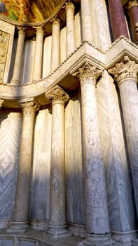 marble column of cathedral San macro in Venice, Italy