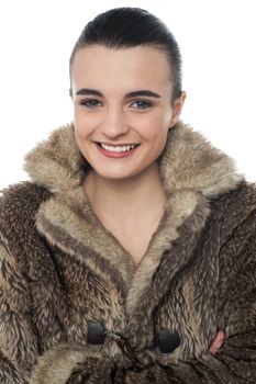 Image of a stylish young girl in fur jacket