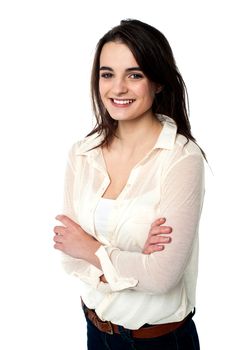 Stylish young girl posing with folded arms