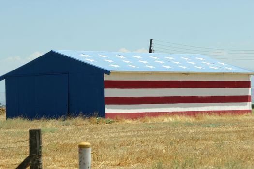 Big American flag painted on a warehouse