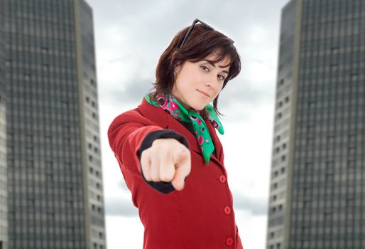 young business woman pointing, at the office