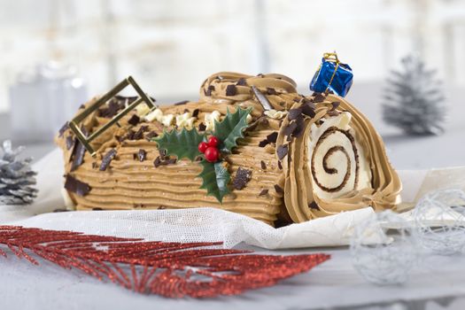 a yule log cake, traditional of christmas time