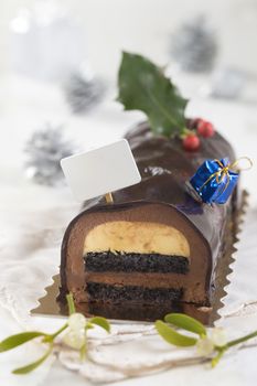 Christmas chocolate yule log cake with decoration