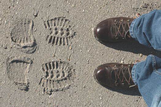 footprints on the sand of shoes man