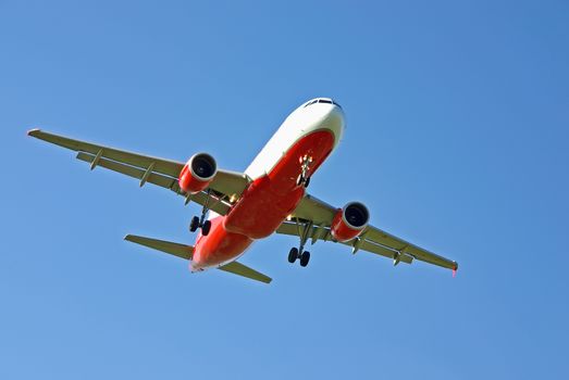Red and white commercial aircraft