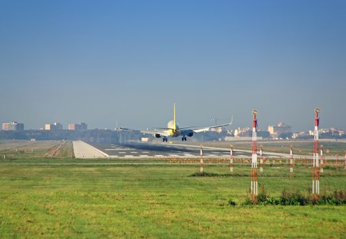 Passenger plane landing in the airport