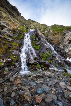 River watterfall flowing over rough rocks