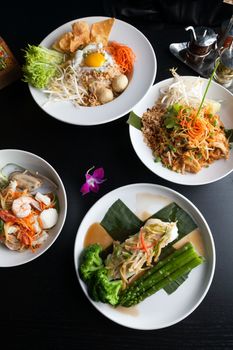 Variety of authentic Thai cuisine and stir fry dishes.  Shallow depth of field.