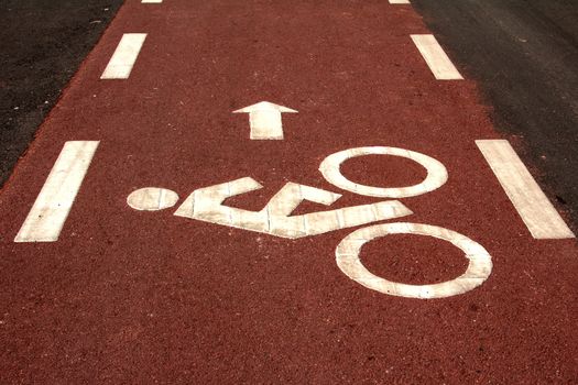 Bicycle road sign and arrow in outdoors