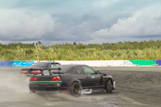 Cornering technique with the use of a controlled drift at the maximum speed    