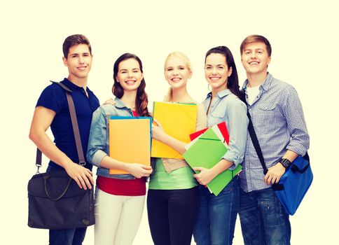 education and people concept - group of smiling students standing