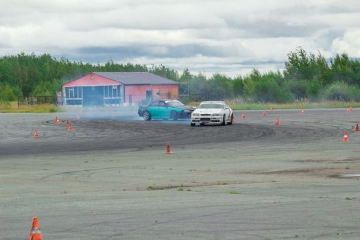 Cornering technique with the use of a controlled drift at the maximum speed    