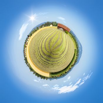 An image of a beautiful tiny planet countryside