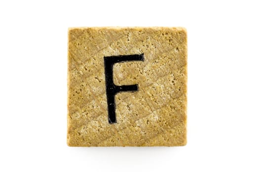 Wooden alphabet blocks with letters F (Isolated)