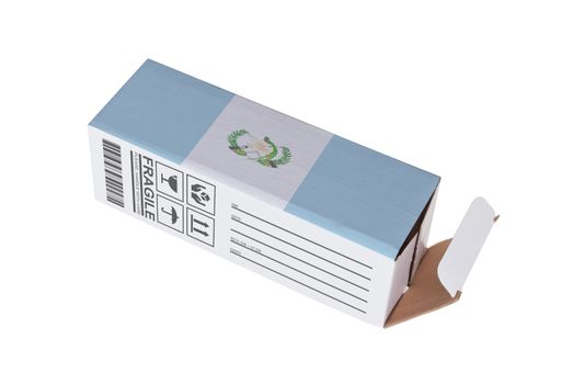 Concept of export, opened paper box - Product of Guatemala