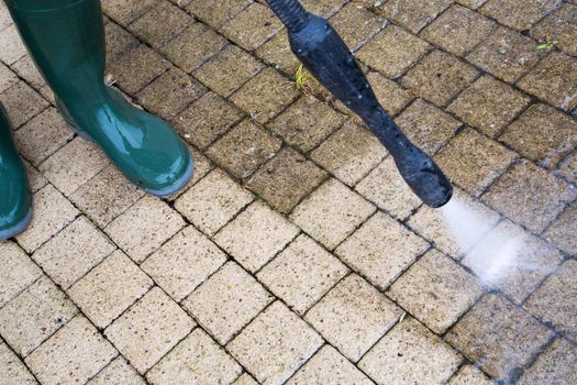 Outdoor floor cleaning with high pressure water jet