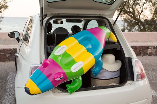 The car trunk full of beach accessories