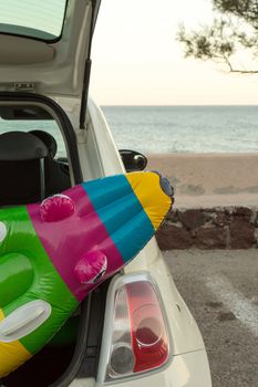 The car trunk full of beach accessories