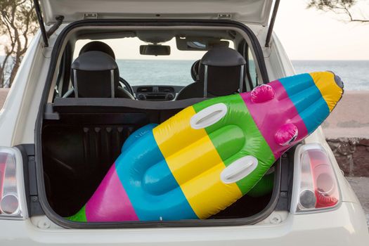 The car trunk full of beach accessories