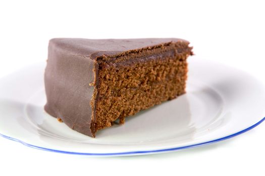 The famous Sacher Cake from Vienna on a white plate